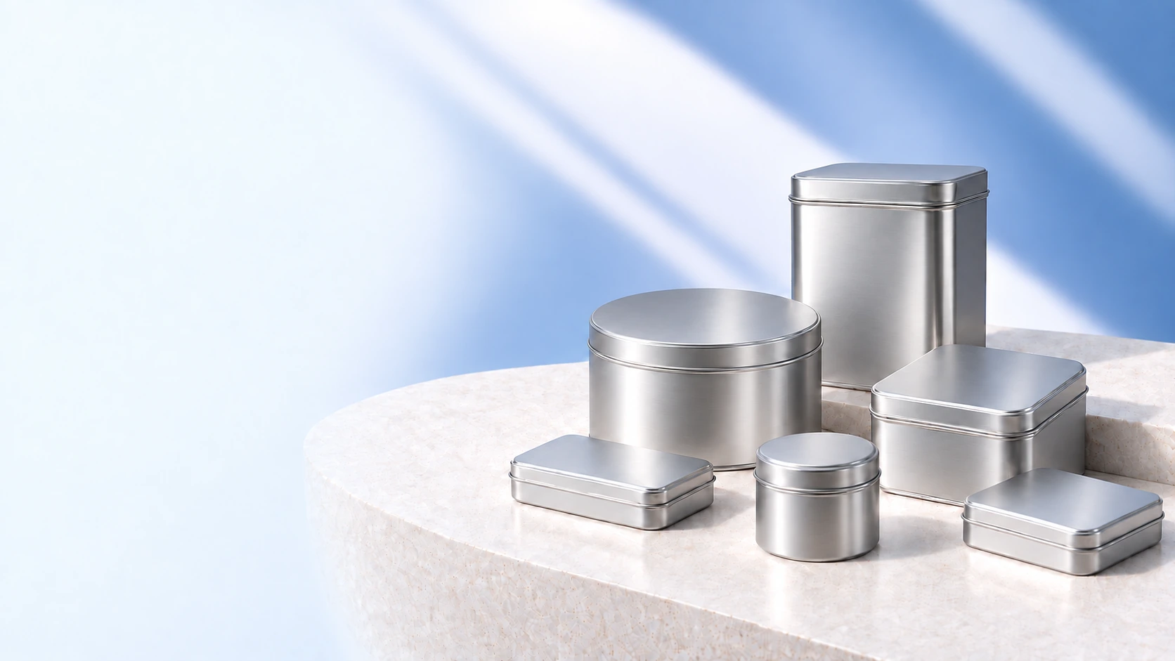 Silver tin packaging in round and rectangular shapes